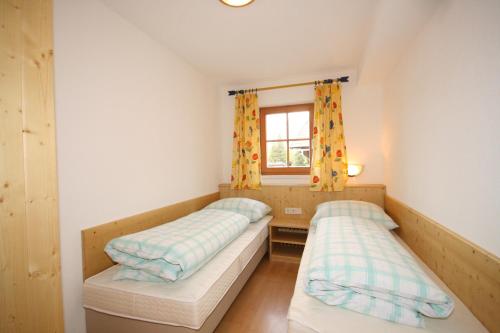 Postel nebo postele na pokoji v ubytování Appartement Steinacher