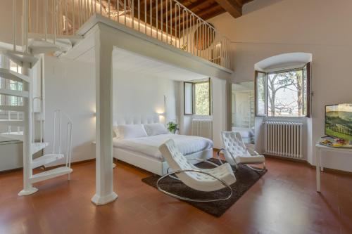 Posteľ alebo postele v izbe v ubytovaní Villa I Barronci Resort & Spa