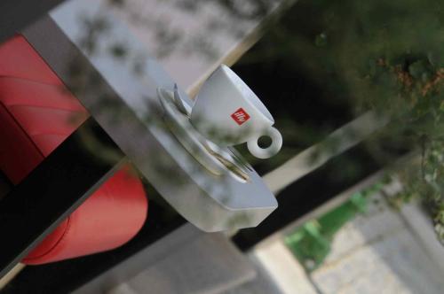 a white object is sticking out of a car window at Hotel Merlot in Louny