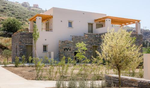 a villa with a view of the house at Vourkari Village in Vourkarion