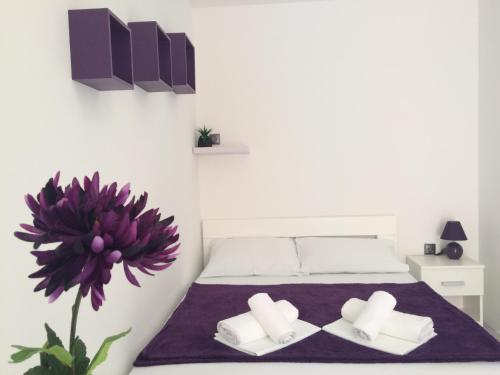 Postel nebo postele na pokoji v ubytování Apartments Nina