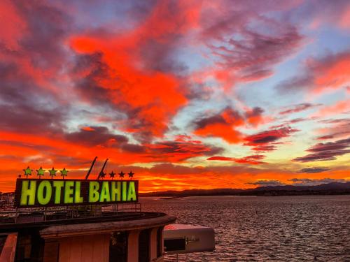 a hotel balma sign on a cruise ship at sunset at Hotel Bahía in Santander