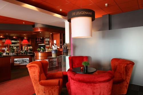 Lounge atau bar di Hotel De Leugenaar