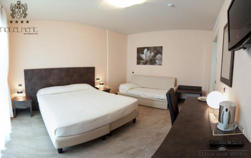 Postel nebo postele na pokoji v ubytování Hotel Kent