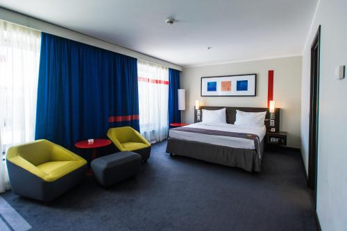 Кровать или кровати в номере Piter Inn