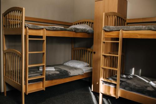 a bunk bed room with three bunk beds at Meteor apartment XXL in Cluj-Napoca