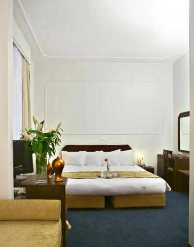 Cama o camas de una habitación en Arni Hotel Domotel