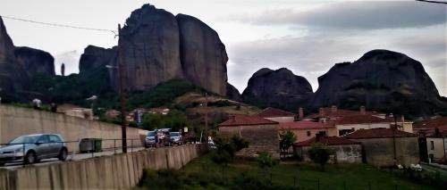 a view of a mountain with cars on a road at Kostis Hause in Kastrákion