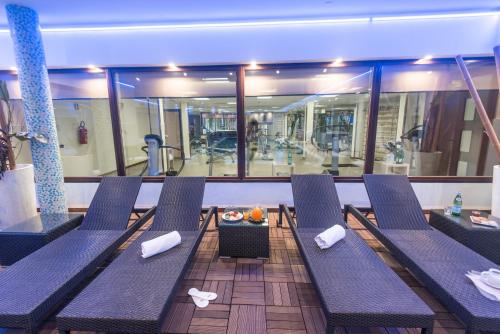 Zona de estar de As Hotel Cambiago