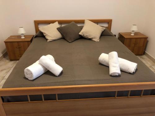 Een bed of bedden in een kamer bij Casa Vacanze Alcantara