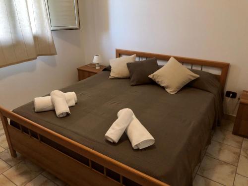 Katil atau katil-katil dalam bilik di Casa Vacanze Alcantara