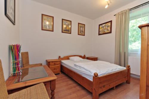 Postel nebo postele na pokoji v ubytování Borostyán 20 Vendégház
