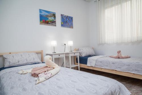 A bed or beds in a room at Apartment SolMar