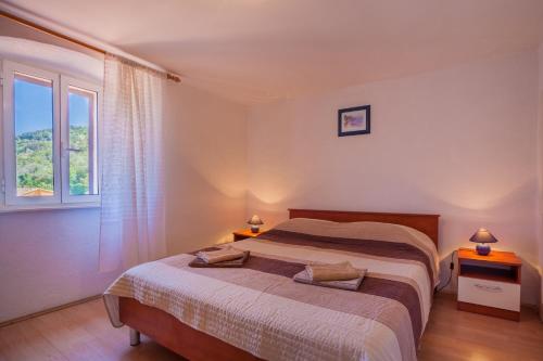 Fotografie z fotogalerie ubytování Apartment and Room Surdić v destinaci Valun