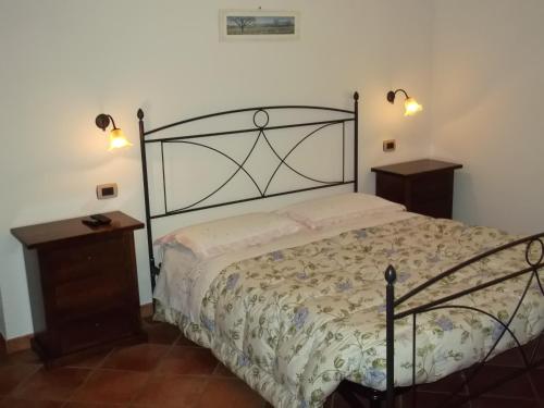 Ένα ή περισσότερα κρεβάτια σε δωμάτιο στο B&B Il Girasole - Rooms & House in country - air conditioned - 1500 meters from historic center