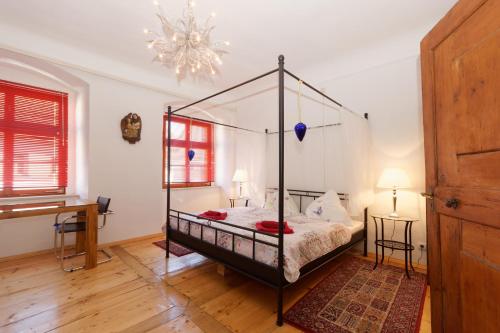 En eller flere senge i et værelse på Klosterherberge