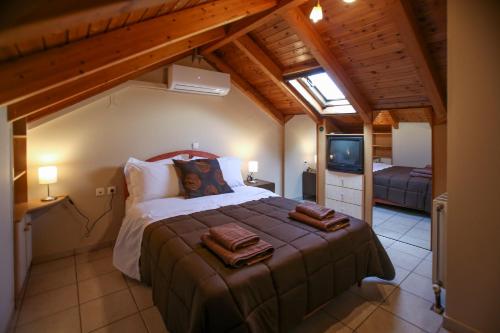 מיטה או מיטות בחדר ב-Ira Apartments