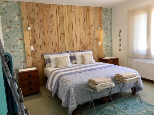Ένα ή περισσότερα κρεβάτια σε δωμάτιο στο Casapapudo Boutique Suites