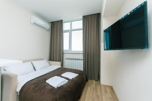 Postel nebo postele na pokoji v ubytování Inn Kiev