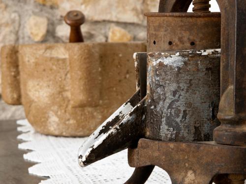 a close up of a metal object with a pot at Hostal Fabrellas in Caldes de Malavella