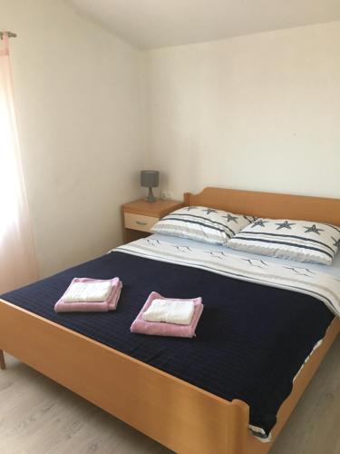 Postel nebo postele na pokoji v ubytování Beach house Korina