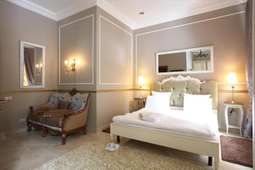 Letto o letti in una camera di Theatre Boutique Apartments