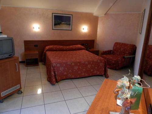 Katil atau katil-katil dalam bilik di Hotel Stazione