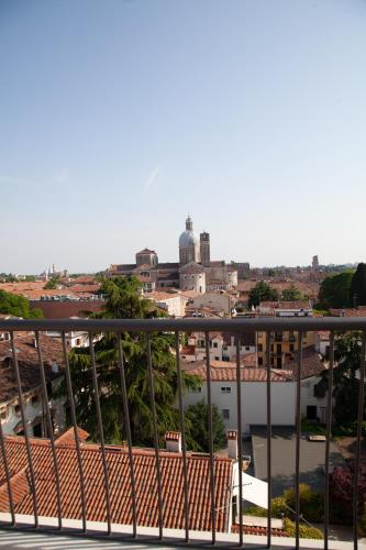 a view of a city from a balcony at M14 SkyView City Center in Padova