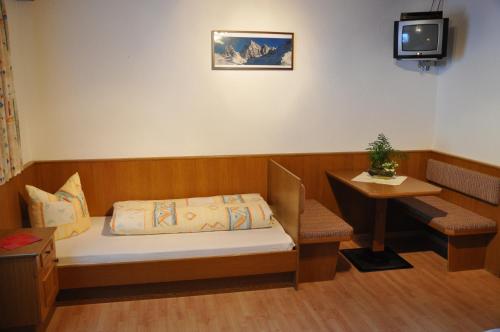 a hospital room with a bed and a tv at Alpenspirit in Sölden