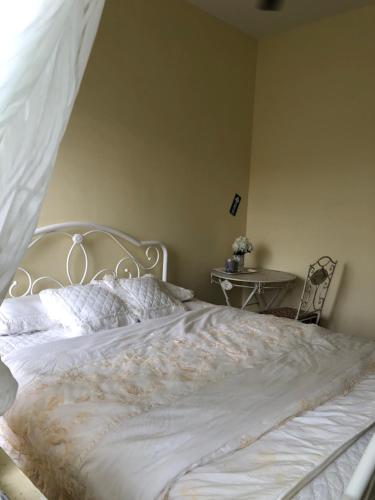Postel nebo postele na pokoji v ubytování AAM Hotel