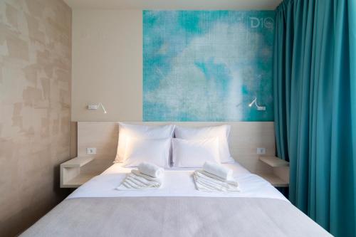 Garni Hotel D10にあるベッド