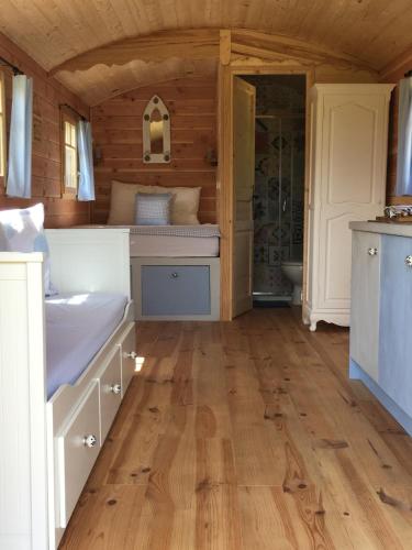 a bathroom with a sink and a toilet in a room at Coutillard in Parisot-Tarn-et-Garonne