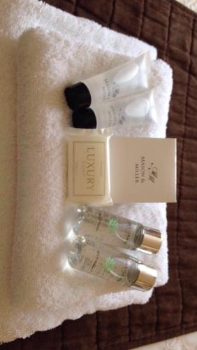 a group of products sitting on a white towel at The Bay Guest House in Weymouth