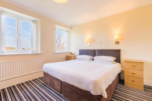 Ένα ή περισσότερα κρεβάτια σε δωμάτιο στο Marton Guest House