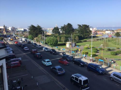 a busy city street filled with lots of cars at Balmoral in Skegness