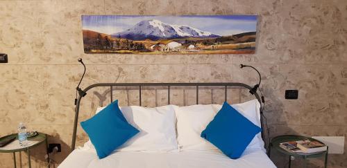 Postel nebo postele na pokoji v ubytování La Corte B&B