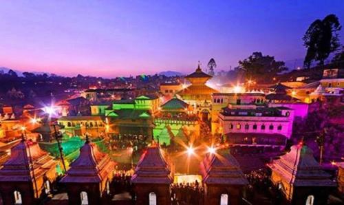 a view of a city at night with lights at Everest Home Stay Apartment in Pātan