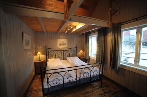 Reine Rorbuer - by Classic Norway Hotelsにあるベッド