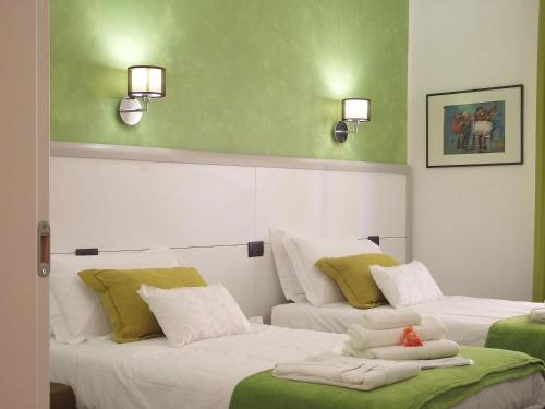 Ένα ή περισσότερα κρεβάτια σε δωμάτιο στο La casa di Atena