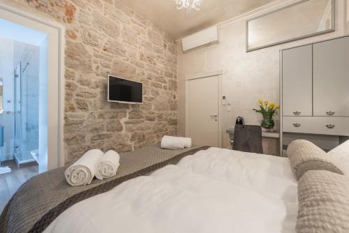 Ένα ή περισσότερα κρεβάτια σε δωμάτιο στο Zara Palace - design rooms