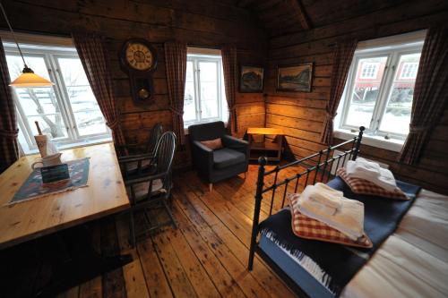 Reine Rorbuer - by Classic Norway Hotelsにあるシーティングエリア