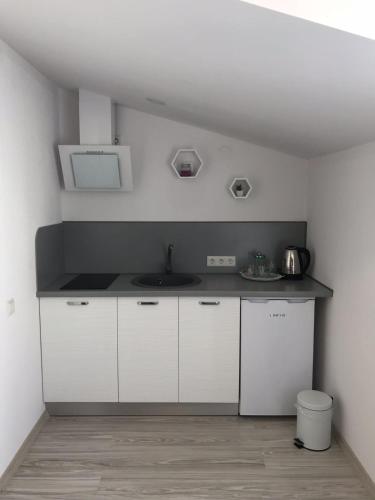 Dapur atau dapur kecil di Tukums apartments