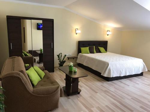 Postel nebo postele na pokoji v ubytování Tukums apartments