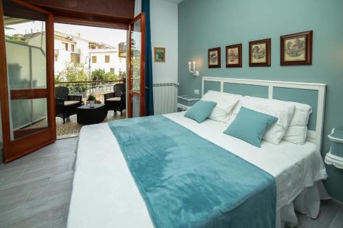 Postel nebo postele na pokoji v ubytování Casa Minna - De Vivo Realty Sant'Agnello