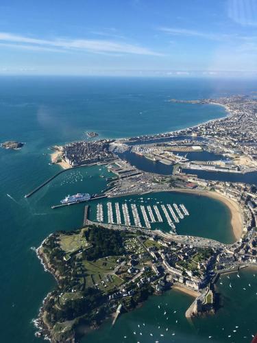 an aerial view of an island in the water at Le Pas Saint Joseph in Saint Malo