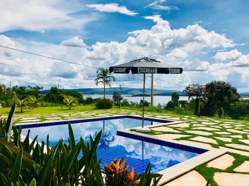 Πισίνα στο ή κοντά στο Casa Lago de Furnas
