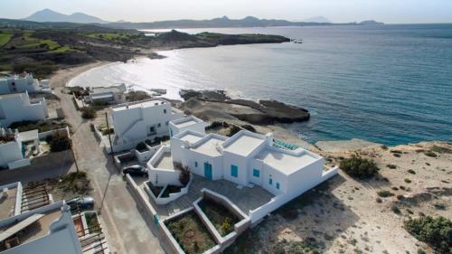 an aerial view of a beach with white buildings at Villa Zefyros in Pachaina