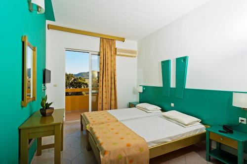 Photo de la galerie de l'établissement Trianta Hotel Apartments, à Ialyssos