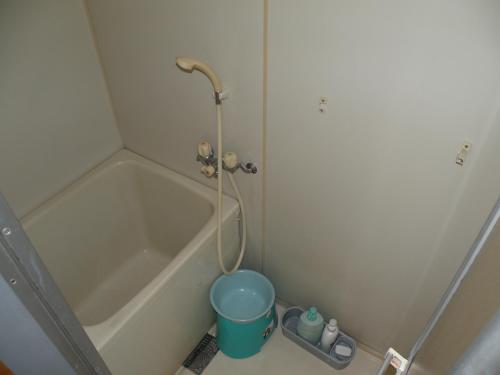 Bilik mandi di Business Hotel Minshuku Minato