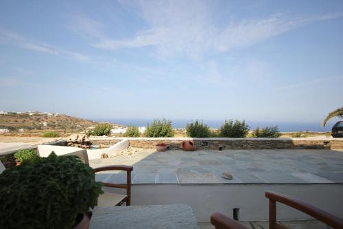 a patio with a view of the ocean at Arhontou in Apollonia